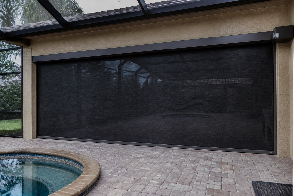 Fully closed roll-down hurricane screen housing over a Florida lanai pool-cage opening